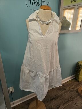 Sleeveless White Collared V-Neck Ruffle Hem Dress